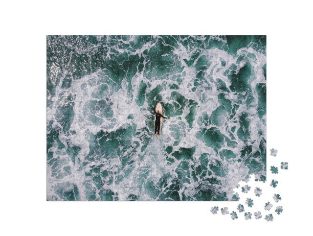 Puzzle 1000 Teile „Surfer in der rauhen See von Saunton Sands, Devon“