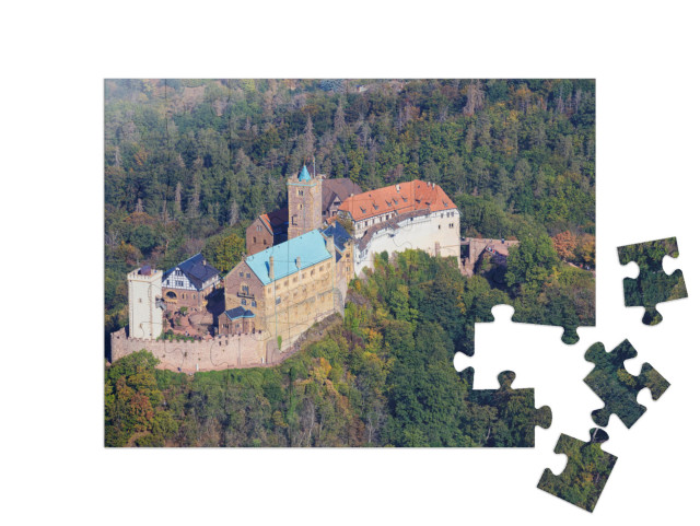 Puzzle 48 Teile „Die Wartburg in Eisenach, wo Martin Luther die Bibel übersetzte“