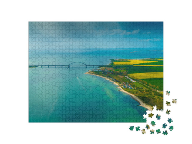 Puzzle 1000 Teile „Luftbildaufnahme der Insel Fehmarn und Fehmarnsundbrücke “