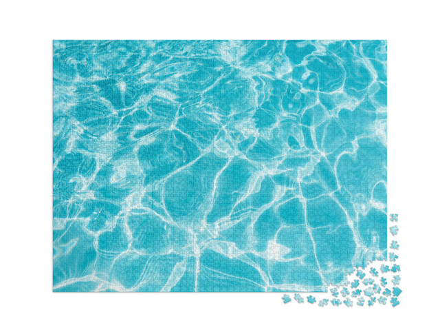 Puzzle 2000 Teile „Plätscherndes Wasser im Schwimmbad mit Sonnenreflexion“