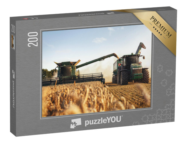 Puzzle 200 Teile „Mähdrescher und Traktor bei der Arbeit auf einem Weizenfeld“