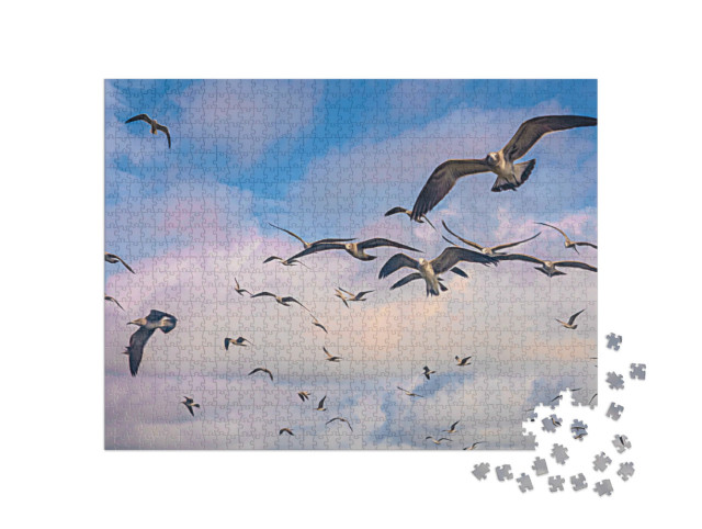 Puzzle 1000 Teile „Schwarm von Möwen im Flug über den Himmel“