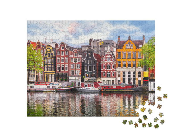 Puzzle 1000 Teile „Die tanzenden Häuser an der Amstel, Wahrzeichen von Amsterdam“