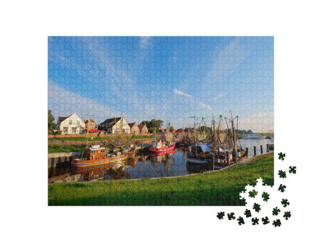 Puzzle 1000 Teile „Der Fischereihafen von Greetsiel, Deutschland“