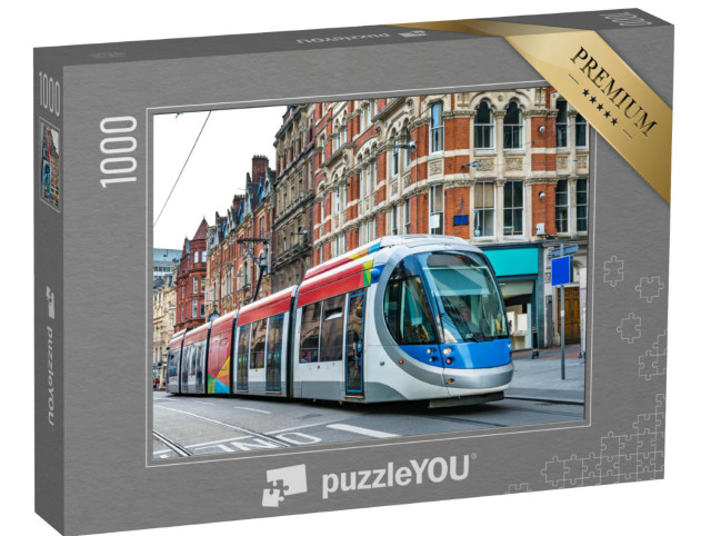 Puzzle 1000 Teile „Straßenbahn auf einer Straße in Birmingham in England“