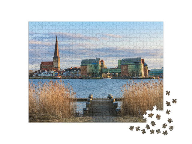 Puzzle 1000 Teile „Blick über Warnow nach Rostock, Deutschland“