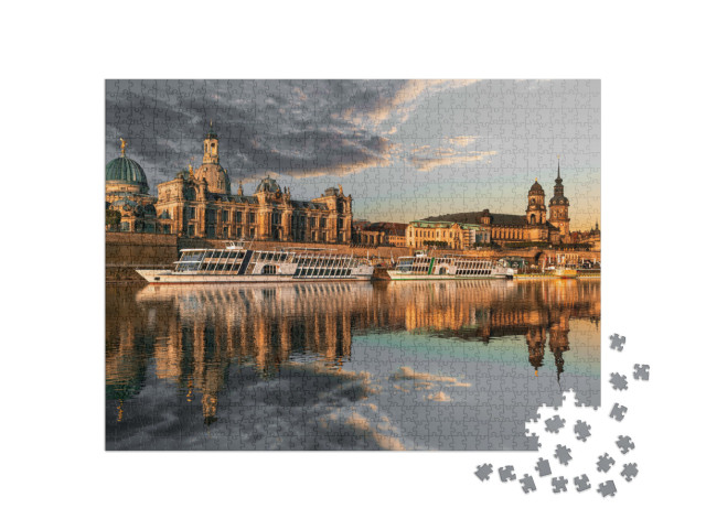 Puzzle 1000 Teile „Dresdner Stadtsilhouette an der Elbe und Augustusbrücke bei Sonnenuntergang“