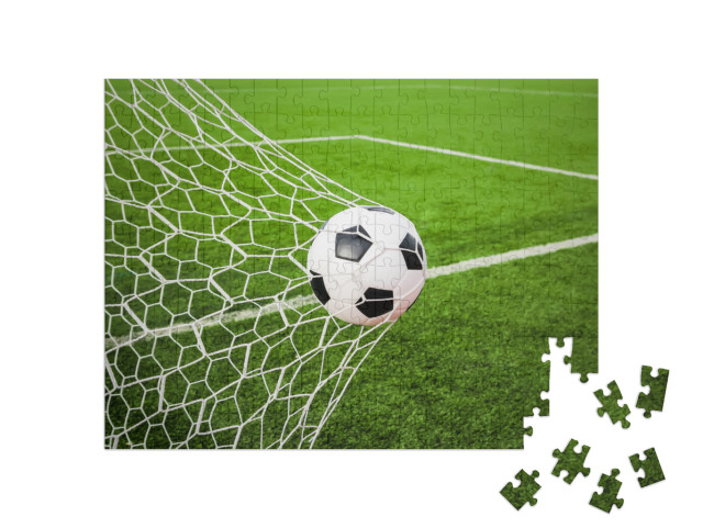 Puzzle 200 Teile „Fußball im Tor-Netz“