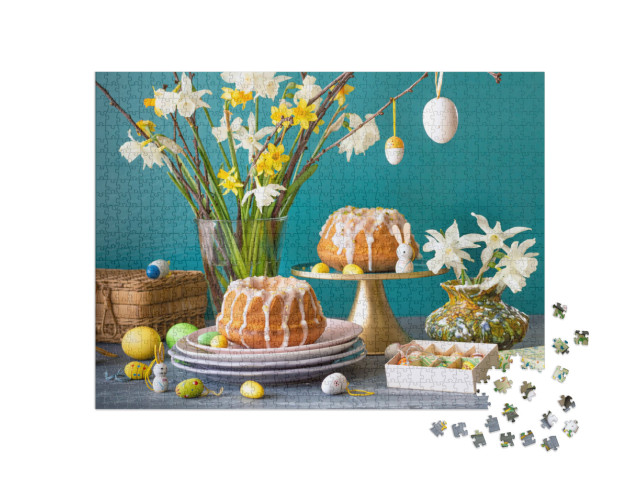 Puzzle 1000 Teile „Osterkuchen mit Narzissen und Ostereiern“