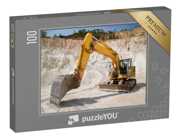 Puzzle 100 Teile „Hydraulischer Raupenbagger bei der Arbeit im Steinbruch“
