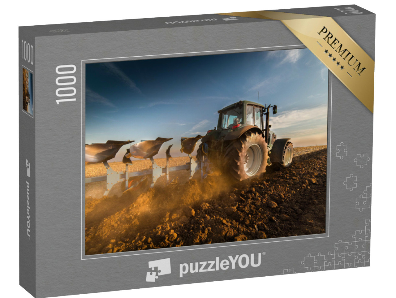 Puzzle 1000 Teile „Traktor beim Pflügen von Feldern“