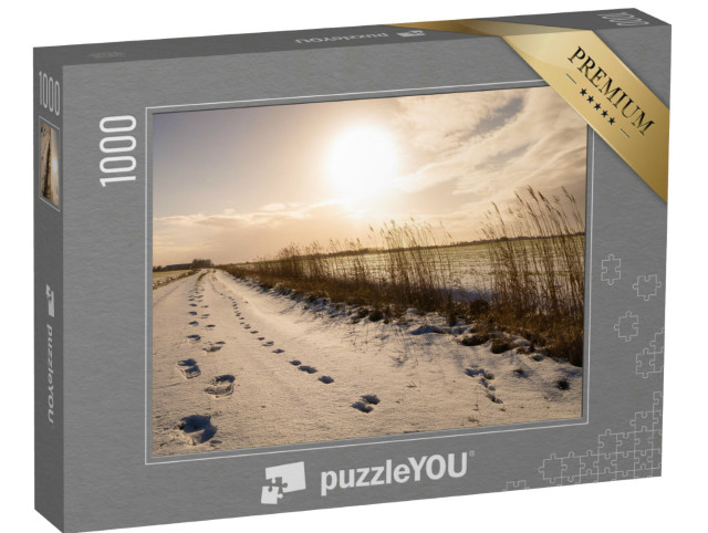 Puzzle 1000 Teile „Fußspuren durch den Schnee, Ostfriesland“