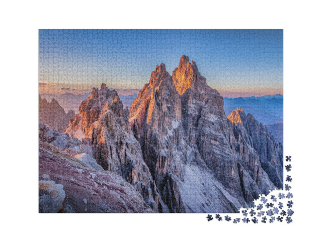 Puzzle 2000 Teile „Alpenglühen über den Berggipfeln der Dolomiten“