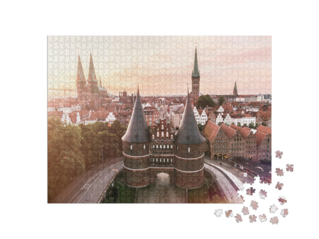 Puzzle 1000 Teile „Holstentor der Hansestadt Lübeck bei Sonnenaufgang“