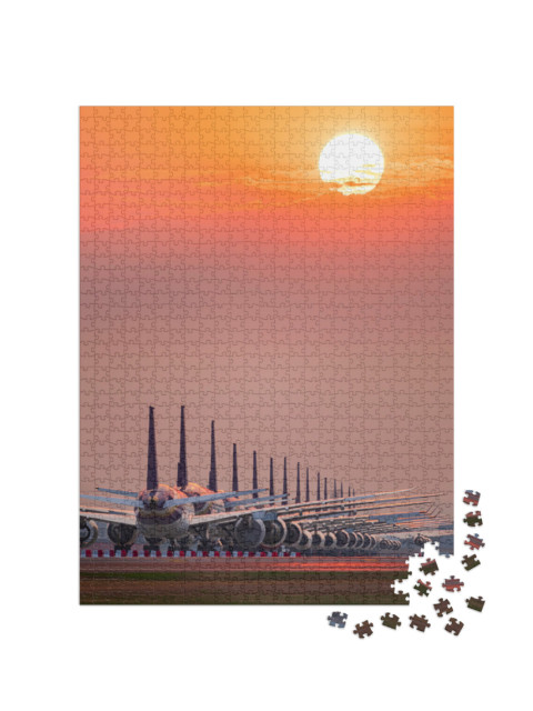 Puzzle 1000 Teile „Perfekt geparkte Flugzeuge im Sonnenuntergang“