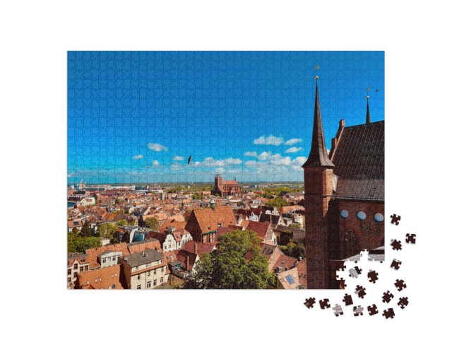 Puzzle 1000 Teile „Blick über Wismar von der Spitze der Georgienkirche“