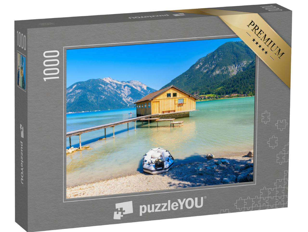 Puzzle 1000 Teile „Bootshaus am Ufer des Achensees, Österreich“