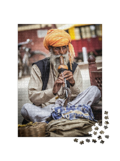 Puzzle 1000 Teile „Schlangenbeschwörer an einer Straße in Indien“