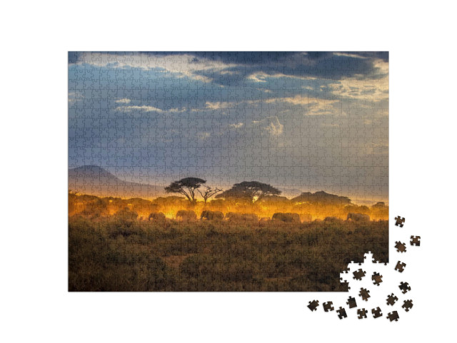 Puzzle 1000 Teile „Wanderung der Elefanten am Abend in der afrikanischen Savanne“