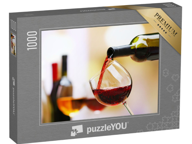 Puzzle 1000 Teile „Rotwein fließt in ein Weinglas als Nahaufnahme “