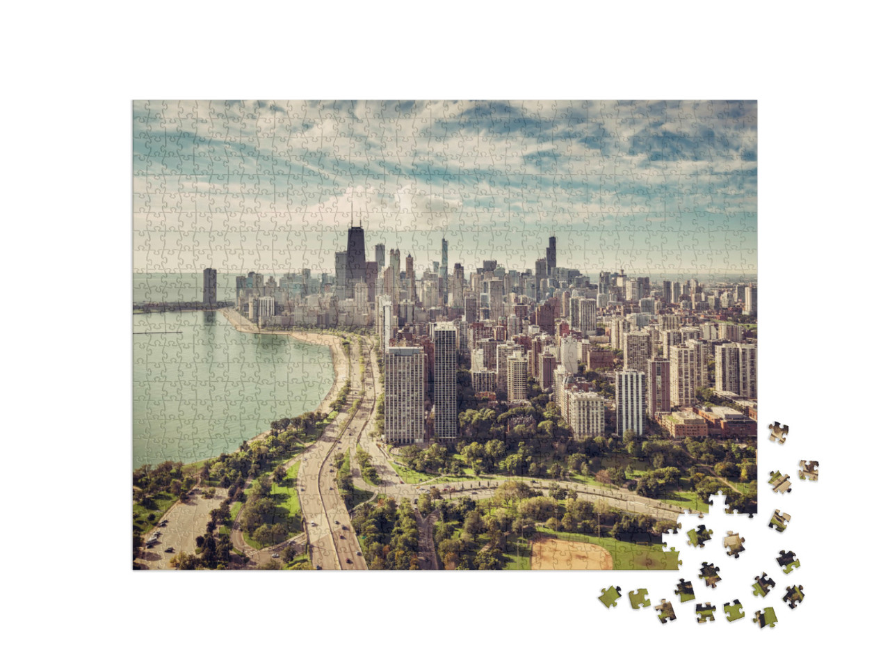 Puzzle 1000 Teile „Chicago Skyline mit Straße am Strand aus der Luft“