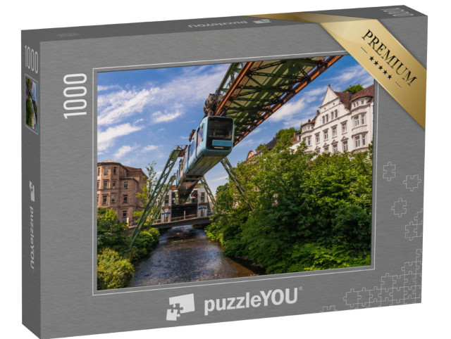 Puzzle 1000 Teile „Die Schwebende Straßenbahn in Wuppertal“