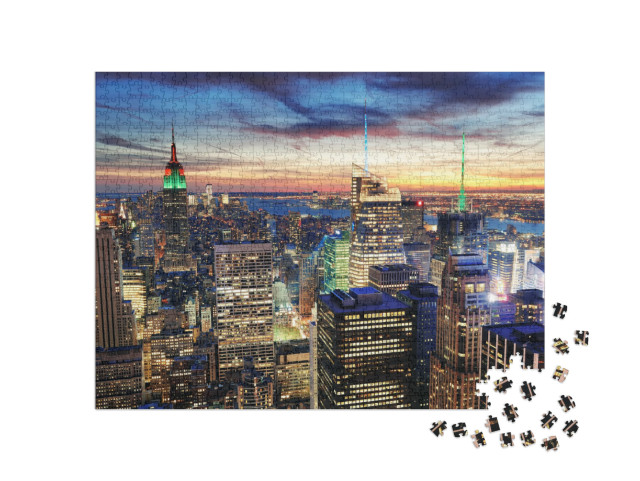 Puzzle 1000 Teile „Wolkenkratzer von New York City im Sonnenuntergang“