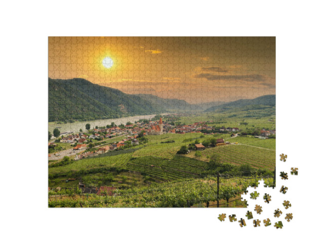 Puzzle 1000 Teile „Blick auf das Wachautal mit Donau und der Stadt Weißenkirchen“