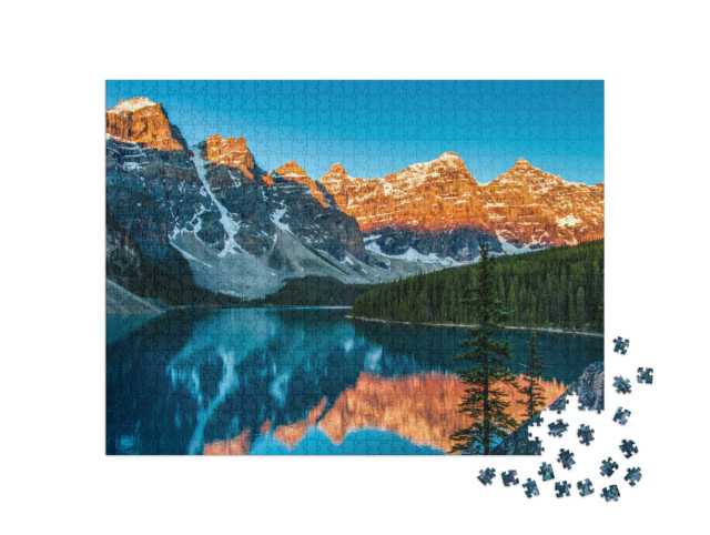 Puzzle 1000 Teile „Sonnenaufgang am Moraine Lake im Banff National Park“