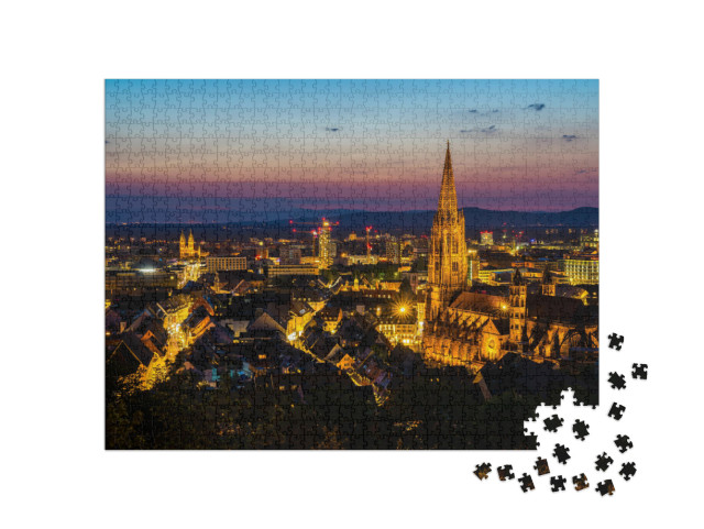 Puzzle 1000 Teile „Freiburg im Breisgau bei Nacht“